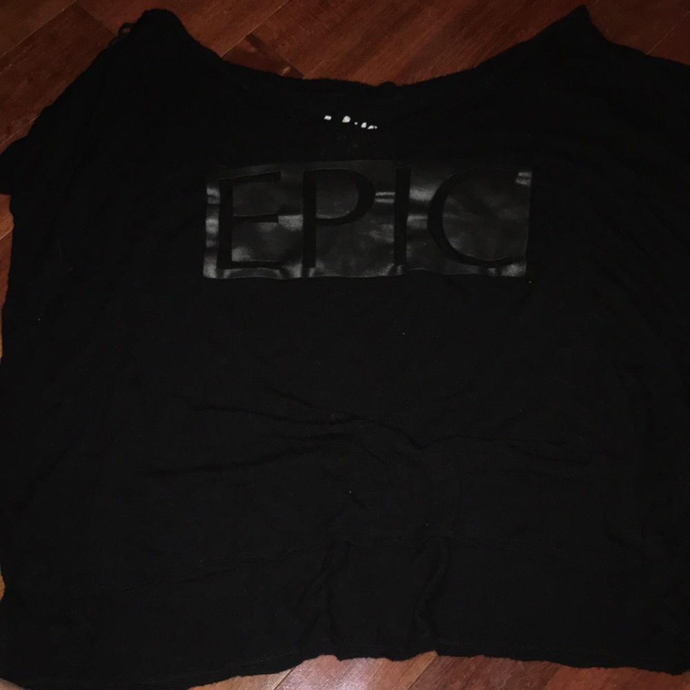 Black crop top with “EPIC” printed on it.